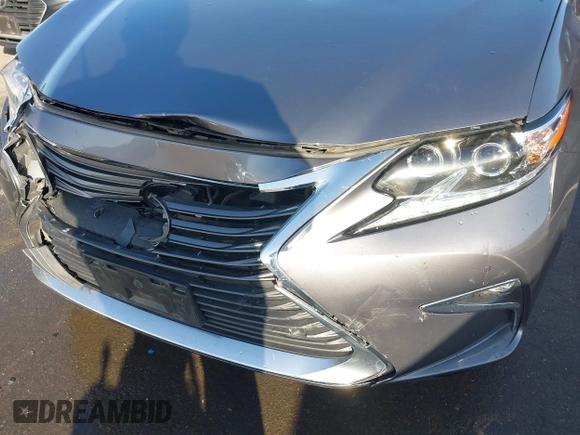 2016 Lexus ES 300h z VIN JTHBW1GG6G2108510, wystawiony jako IAAI lot #41959175 z przebiegiem 142 882 mil mil oraz . Historia ofert i sprzedaży dostępna na DreamBid. Obrazek 17.