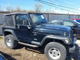 2000 Jeep Wrangler Sport with VIN 1J4FA49S8YP749547, listed as a IAAI auction lot 41861030 with 110,186 mi miles and . Bid and sale history available at DreamBid. Image 13.