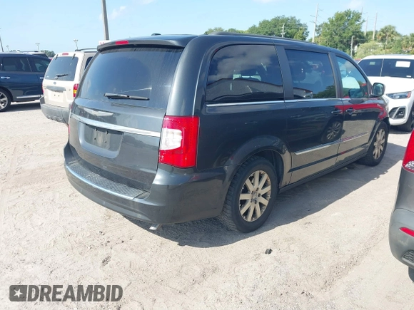 2011 Chrysler Town & Country Touring-L with VIN 2A4RR8DG4BR784138, listed as a IAAI auction lot 42124052 with 105,645 mi miles. Bid and sale history available at carsss.com. Image 4.