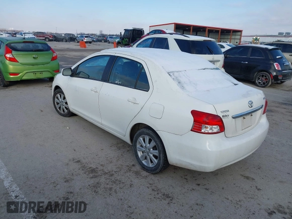 2009 Toyota Yaris z VIN JTDBT903991341371, wystawiony jako IAAI lot #41472292 z przebiegiem 205 596 mil mil oraz . Historia ofert i sprzedaży dostępna na DreamBid. Obrazek 3.