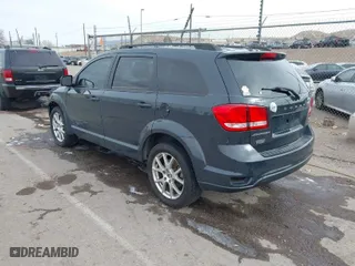 2018 Dodge Journey SXT with VIN 3C4PDCBB0JT243881, listed as a IAAI auction lot 41599681 with 143,893 mi miles. Bid and sale history available at carsss.com. Image 3.
