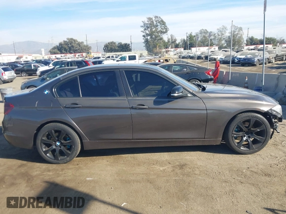 2014 BMW 3 Series 328i with VIN WBA3A5C56EP603819, listed as a IAAI auction lot 41217764 with 156,140 mi miles and . Bid and sale history available at carsss.com. Image 13.