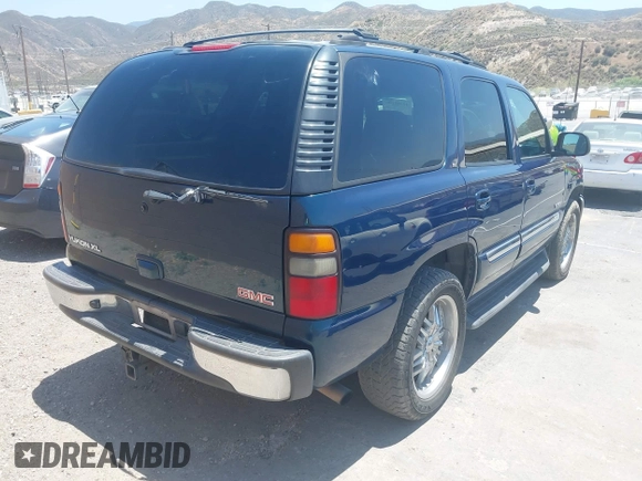 2005 GMC Yukon SLE z VIN 1GKEC13T85R150731, wystawiony jako IAAI lot #42385199 z przebiegiem 199 527 mil mil oraz . Historia ofert i sprzedaży dostępna na DreamBid. Obrazek 4.