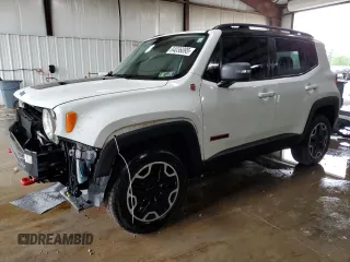 2015 Jeep Renegade Trailhawk z VIN ZACCJBCT8FPB78351, wystawiony jako Copart lot #64036095 z przebiegiem 127 784 mil mil oraz Szkoda całkowita • Salvage title. Historia ofert i sprzedaży dostępna na DreamBid. Obrazek 1.