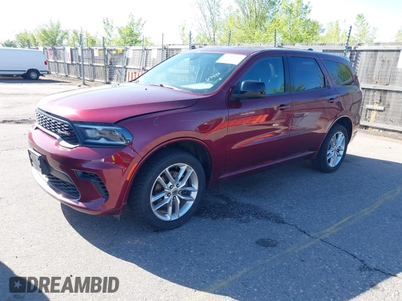 2023 Dodge Durango GT with VIN 1C4RDJDG5PC617489, listed as a IAAI auction lot 42084530 with 70,659 mi miles and . Bid and sale history available at DreamBid. Image 2.