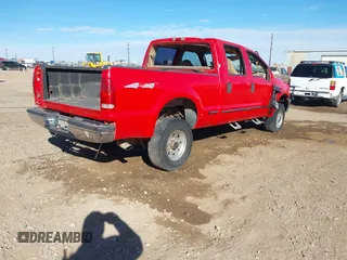 1999 Ford Super Duty F-250 XL with VIN 1FTNW21F7XEA71082, listed as a IAAI auction lot 41665200 with 210,841 mi miles. Bid and sale history available at carsss.com. Image 4.