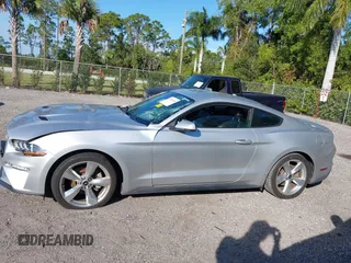 2019 Ford Mustang EcoBoost with VIN 1FA6P8TH9K5173906, listed as a IAAI auction lot 41343490 with 57,269 mi miles and . Bid and sale history available at carsss.com. Image 14.