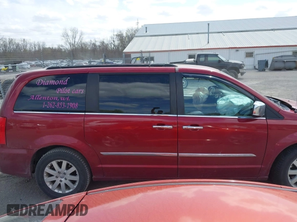 2012 Chrysler Town & Country Touring-L with VIN 2C4RC1CG2CR118526, listed as a IAAI auction lot 42034318 with 337,747 mi miles. Bid and sale history available at carsss.com. Image 14.