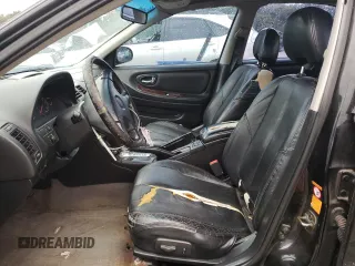 2000 Nissan Maxima GXE z VIN JN1CA31A8YT210913, wystawiony jako Copart lot #56272455 z przebiegiem 281 645 mil mil oraz Nie do naprawy • Non repairable. Historia ofert i sprzedaży dostępna na DreamBid. Obrazek 7.