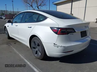 2023 Tesla Model 3 with VIN 5YJ3E1EA6PF411940, listed as a IAAI auction lot 41829537 with 32,877 mi miles and . Bid and sale history available at carsss.com. Image 3.