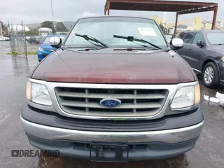 2001 Ford F-150 XL z VIN 1FTZX17291NB67560, wystawiony jako IAAI lot #41582004 z przebiegiem 96 858 mil mil oraz . Historia ofert i sprzedaży dostępna na DreamBid. Obrazek 12.