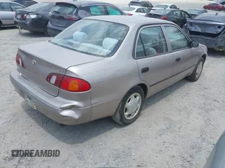 1998 Toyota Corolla VE with VIN 1NXBR12E0WZ051301, listed as a IAAI auction lot 42701905 with Not provided miles and . Bid and sale history available at DreamBid. Image 4.