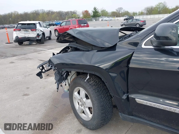2011 Jeep Grand Cherokee Laredo z VIN 1J4RR4GG8BC504878, wystawiony jako IAAI lot #42097973 z przebiegiem 190 583 mil mil oraz . Historia ofert i sprzedaży dostępna na DreamBid. Obrazek 15.