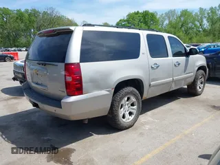 2007 Chevrolet Suburban LT with VIN 3GNFK16367G246091, listed as a IAAI auction lot 42105259 with 216,014 mi miles. Bid and sale history available at carsss.com. Image 4.
