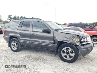 2004 Jeep Grand Cherokee Limited with VIN 1J8GX58N24C333403, listed as a Copart auction lot 73708764 with 145,471 mi miles and Salvage Title. Bid and sale history available at DreamBid. Image 4.