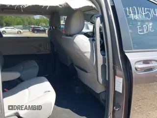 2021 Toyota Sienna LE with VIN 5TDKSKFC4MS004345, listed as a IAAI auction lot 42145140 with 103,544 mi miles and . Bid and sale history available at DreamBid. Image 8.