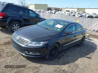 2013 Volkswagen CC Sport with VIN WVWBN7AN6DE509497, listed as a IAAI auction lot 41854748 with 208,227 mi miles and . Bid and sale history available at DreamBid. Image 2.