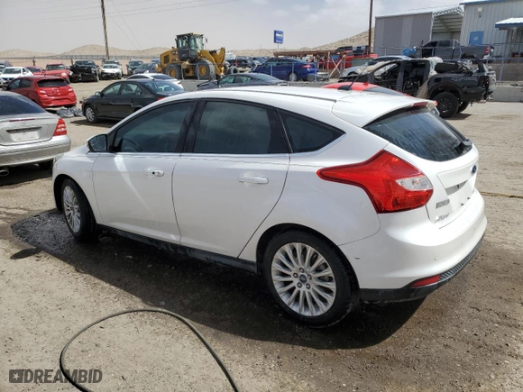 2012 Ford Focus Titanium with VIN 1FAHP3N22CL449814, listed as a Copart auction lot 49080875 with 127,022 mi miles and Salvage Title. Bid and sale history available at carsss.com. Image 2.