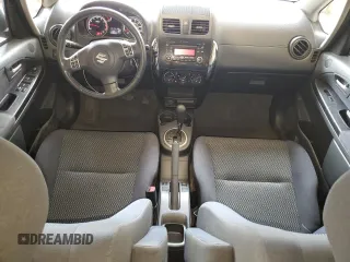2013 Suzuki SX4 Crossover z VIN JS2YB5A38D6100035, wystawiony jako Copart lot #59970015 z przebiegiem 119 995 mil mil oraz Szkoda całkowita • Salvage title. Historia ofert i sprzedaży dostępna na DreamBid. Obrazek 8.