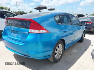 2010 Honda Insight EX with VIN JHMZE2H71AS003290, listed as a IAAI auction lot 42601332 with 163,510 mi miles and . Bid and sale history available at DreamBid. Image 4.