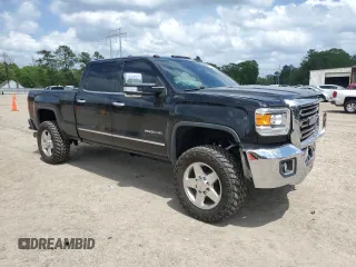 2015 GMC Sierra 2500HD available WiFi SLT with VIN 1GT12ZE87FF602854, listed as a Copart auction lot 51348525 with 96,105 mi miles and Salvage Title. Bid and sale history available at carsss.com. Image 4.