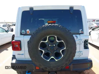2023 Jeep Wrangler Rubicon with VIN 1C4JJXR63PW580370, listed as a IAAI auction lot 42017282 with 31,823 mi miles and . Bid and sale history available at DreamBid. Image 17.