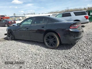 2018 Dodge Charger SXT Plus with VIN 2C3CDXHG2JH329120, listed as a Copart auction lot 49746455 with 106,182 mi miles and Salvage Title. Bid and sale history available at carsss.com. Image 2.