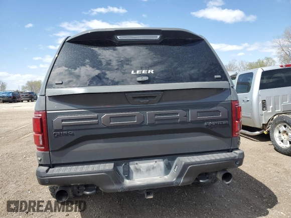 2020 Ford F-150 Raptor with VIN 1FTFW1RG3LFC73188, listed as a Copart auction lot 52573455 with 99,198 mi miles and Salvage Title. Bid and sale history available at carsss.com. Image 6.