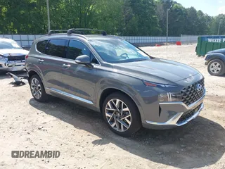 2023 Hyundai Santa Fe Calligraphy with VIN 5NMS54ALXPH633514, listed as a IAAI auction lot 42238114 with 12,969 mi miles and . Bid and sale history available at DreamBid. Image 1.