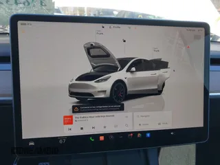 2022 Tesla Model Y Performance with VIN 7SAYGDEF5NF542189, listed as a IAAI auction lot 41643254 with 18,865 mi miles and . Bid and sale history available at DreamBid. Image 17.