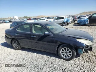 2002 Lexus ES 300 with VIN JTHBF30G720072725, listed as a Copart auction lot 61792275 with 196,805 mi miles and Salvage title. Bid and sale history available at DreamBid. Image 4.
