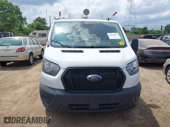 2024 Ford Transit Cargo with VIN 1FTBR1Y89RKA01132, listed as a IAAI auction lot 42668811 with 31,666 mi miles and . Bid and sale history available at DreamBid. Image 12.