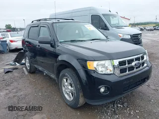 2012 Ford Escape XLT z VIN 1FMCU9D74CKC00087, wystawiony jako IAAI lot #42528584 z przebiegiem 137 471 mil mil oraz . Historia ofert i sprzedaży dostępna na DreamBid. Obrazek 1.