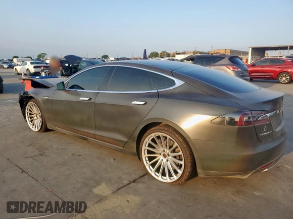 2013 Tesla Model S with VIN 5YJSA1CG0DFP15615, listed as a Copart auction lot 50795235 with 156,030 mi miles and Salvage title. Bid and sale history available at DreamBid. Image 2.