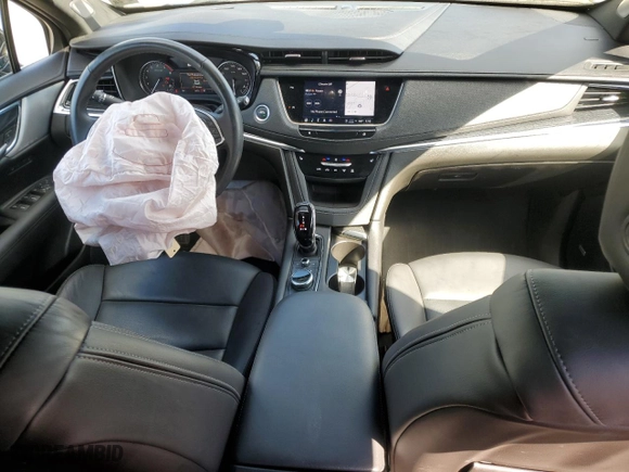 2023 Cadillac XT5 AWD Premium Luxury with VIN 1GYKNDRS3PZ180600, listed as a Copart auction lot 75298904 with 16,936 mi miles and Salvage Title. Bid and sale history available at carsss.com. Image 8.
