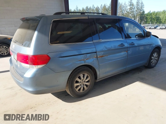 2010 Honda Odyssey EX-L with VIN 5FNRL3H61AB046416, listed as a IAAI auction lot 42157812 with 129,525 mi miles and . Bid and sale history available at DreamBid. Image 4.