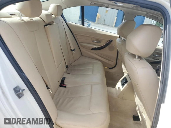 2013 BMW 3 Series 320i xDrive with VIN WBA3C3C57DF980971, listed as a Copart auction lot 57441155 with 131,263 mi miles and Salvage title. Bid and sale history available at DreamBid. Image 10.