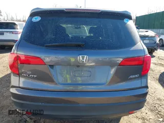 2017 Honda Pilot EX-L with VIN 5FNYF6H59HB101815, listed as a IAAI auction lot 41704661 with 130,479 mi miles and . Bid and sale history available at DreamBid. Image 16.