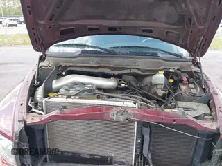 2002 Dodge 1500 with VIN 3D7HU18N52G148095, listed as a IAAI auction lot 42134042 with 180,369 mi miles. Bid and sale history available at carsss.com. Image 10.