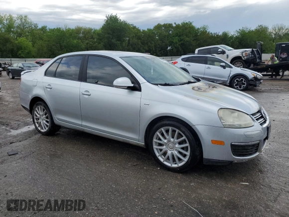 2008 Volkswagen Jetta Wolfsburg Edition with VIN 3VWRJ71KX8M175570, listed as a Copart auction lot 54661175 with 224,830 mi miles and Salvage title. Bid and sale history available at DreamBid. Image 4.