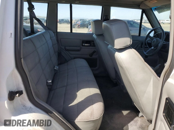 1994 Jeep Cherokee Sport with VIN 1J4FT68S2RL189475, listed as a Copart auction lot 53697465 with 188,210 mi miles and Clean Title. Bid and sale history available at carsss.com. Image 10.