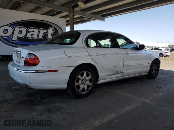 2000 Jaguar S-Type V8 z VIN SAJDA01D7YGL39410, wystawiony jako Copart lot #56814185 z przebiegiem 47 861 mil mil oraz Szkoda całkowita • Salvage title. Historia ofert i sprzedaży dostępna na DreamBid. Obrazek 3.