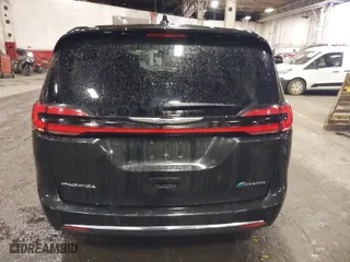 2023 Chrysler Pacifica Hybrid Limited with VIN 2C4RC1S74PR632658, listed as a IAAI auction lot 41862499 with 47,919 mi miles. Bid and sale history available at carsss.com. Image 17.