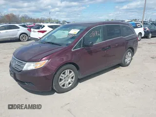 2013 Honda Odyssey LX with VIN 5FNRL5H28DB058401, listed as a IAAI auction lot 42050892 with 221,016 mi miles and . Bid and sale history available at carsss.com. Image 17.