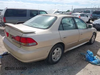 2002 Honda Accord EX z VIN 1HGCG16502A014058, wystawiony jako IAAI lot #42030847 z przebiegiem 160 708 mil mil oraz . Historia ofert i sprzedaży dostępna na DreamBid. Obrazek 4.