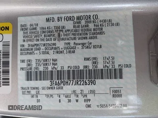 2018 Ford Fusion SE z VIN 3FA6P0H77JR226390, wystawiony jako IAAI lot #42120981 z przebiegiem 114 057 mil mil oraz . Historia ofert i sprzedaży dostępna na DreamBid. Obrazek 9.
