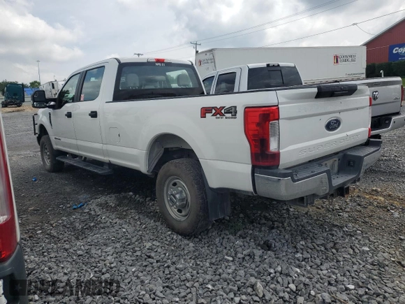 2018 Ford F-350 XL with VIN 1FT8W3BT3JEC37855, listed as a Copart auction lot 63740775 with 128,675 mi miles and Salvage title. Bid and sale history available at DreamBid. Image 2.