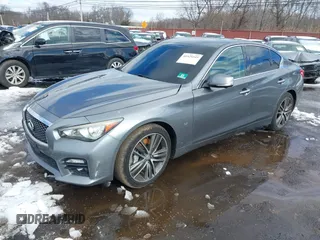 2014 Infiniti Q50 Premium with VIN JN1BV7AR8EM690406, listed as a IAAI auction lot 41525545 with 163,582 mi miles. Bid and sale history available at carsss.com. Image 2.