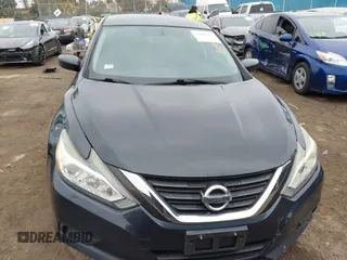 2016 Nissan Altima S with VIN 1N4AL3APXGN360615, listed as a IAAI auction lot 41866447 with 141,060 mi miles and . Bid and sale history available at DreamBid. Image 13.