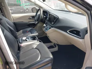 2023 Chrysler Pacifica Hybrid Touring L with VIN 2C4RC1L75PR592251, listed as a IAAI auction lot 42037873 with 44,428 mi miles and . Bid and sale history available at DreamBid. Image 5.